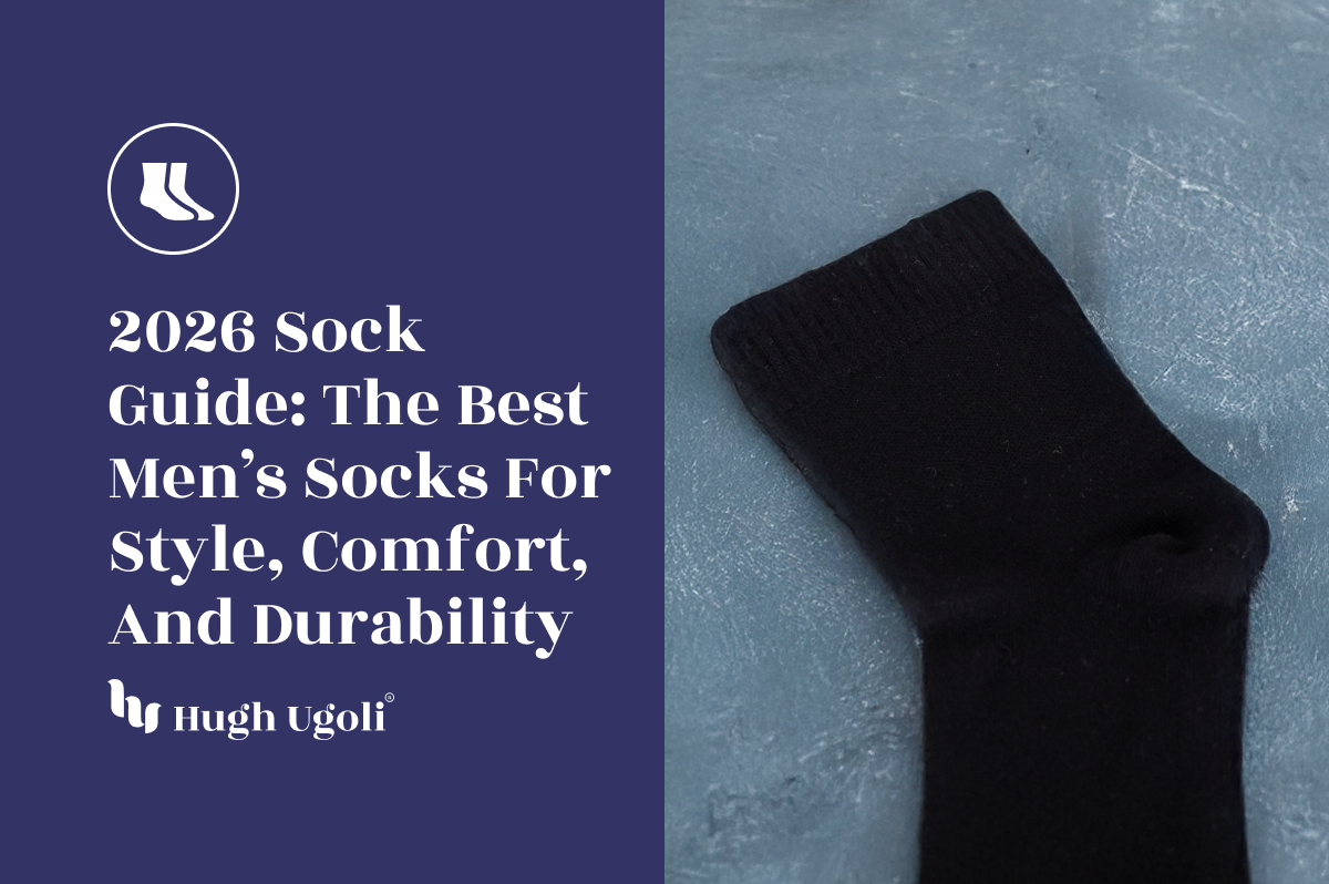 Black sock on a textured gray surface with text about men's socks for style, comfort, and durability.