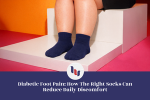 Person wearing navy socks sitting on a white block with an orange and pink background, promoting the importance of proper socks for diabetic foot care.