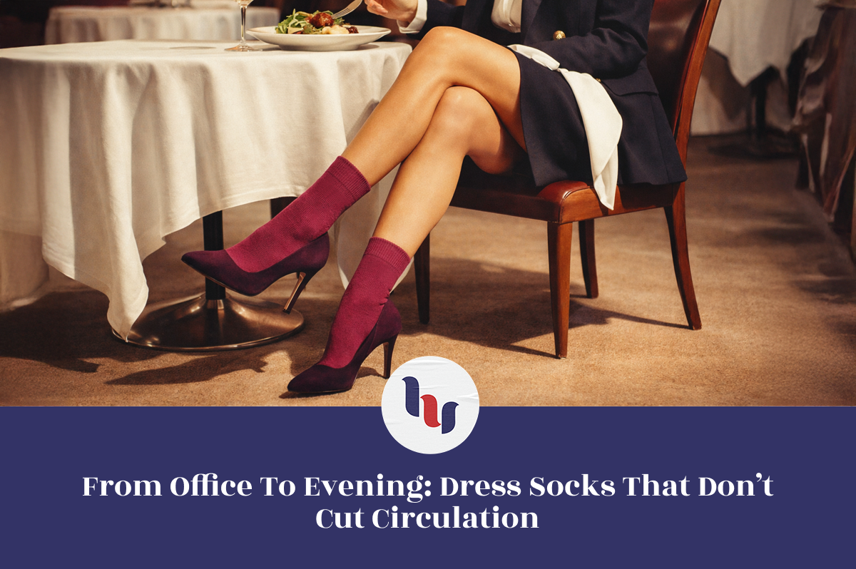 Person sitting at a table with legs crossed wearing purple dress socks in a restaurant setting.