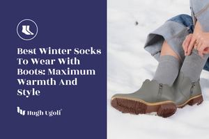 Close-up of grey Hugh Ugoli winter socks worn with stylish ankle boots in the snow, emphasizing maximum warmth, comfort, and seasonal style for cold-weather wear.