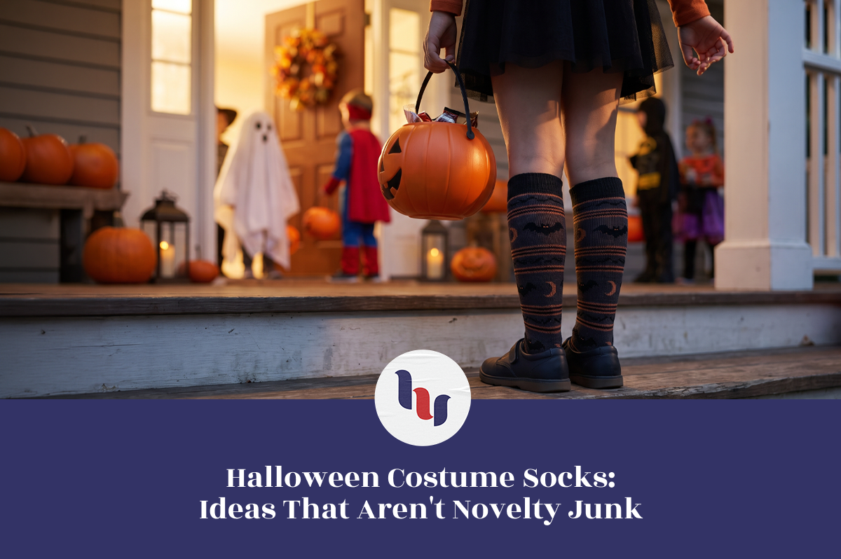 Halloween costume laid out with themed patterned socks as part of the look