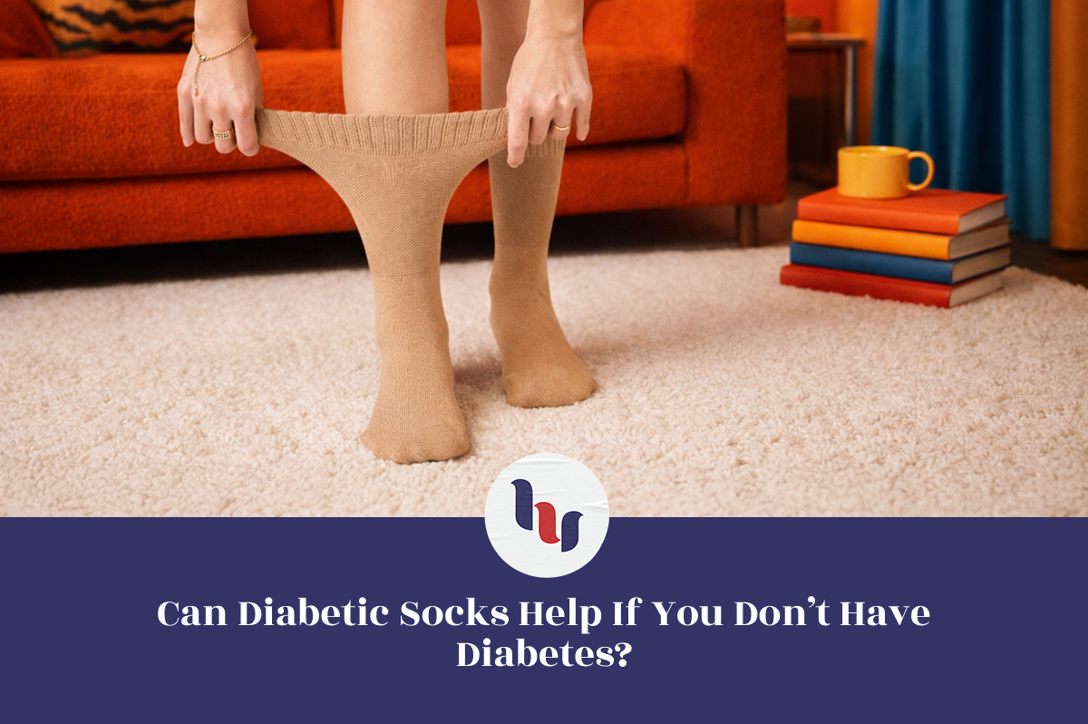 Person wearing beige diabetic socks in a living room setting with books and a cup.