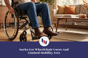 Person in a wheelchair with comfortable socks visible on the footrests