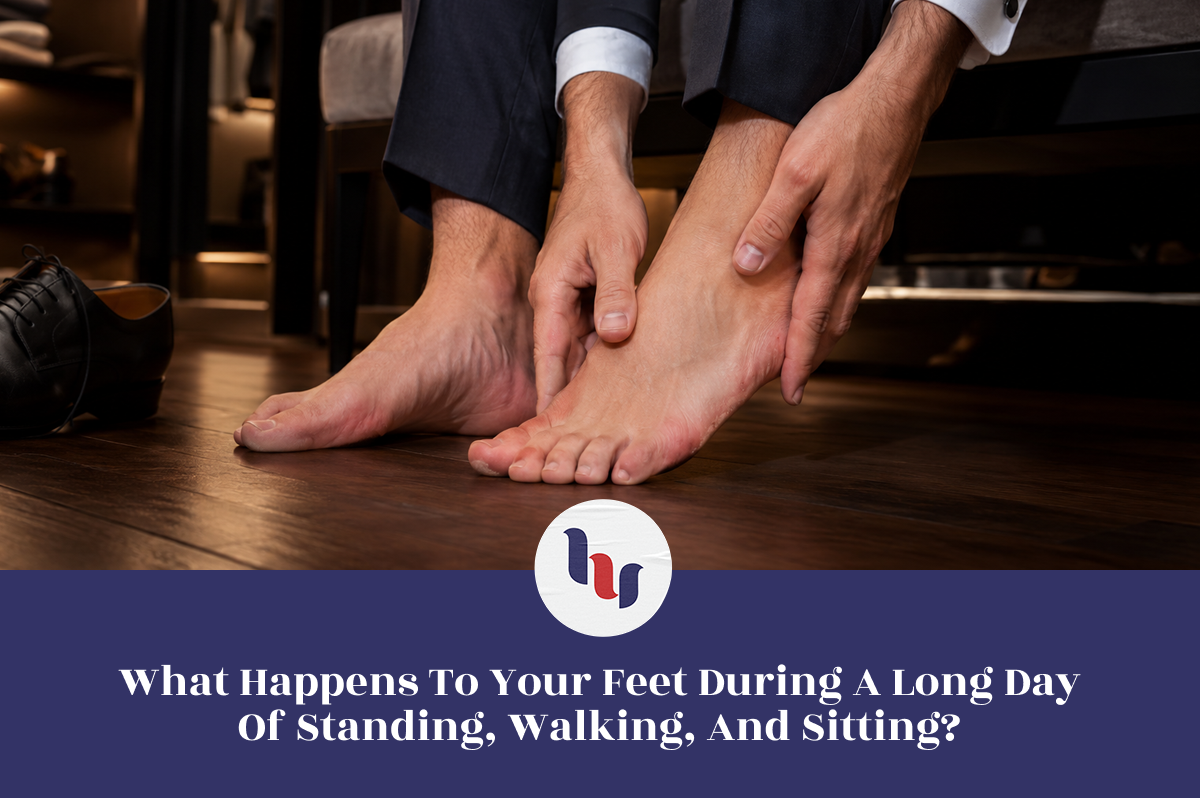 Person massaging tired feet after wearing dress shoes throughout the day.