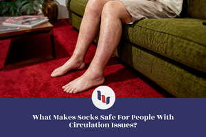 Person sitting on a green couch with bare legs, wearing socks, on a red carpet.