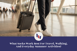Person pulling a suitcase in an airport with text about travel socks.