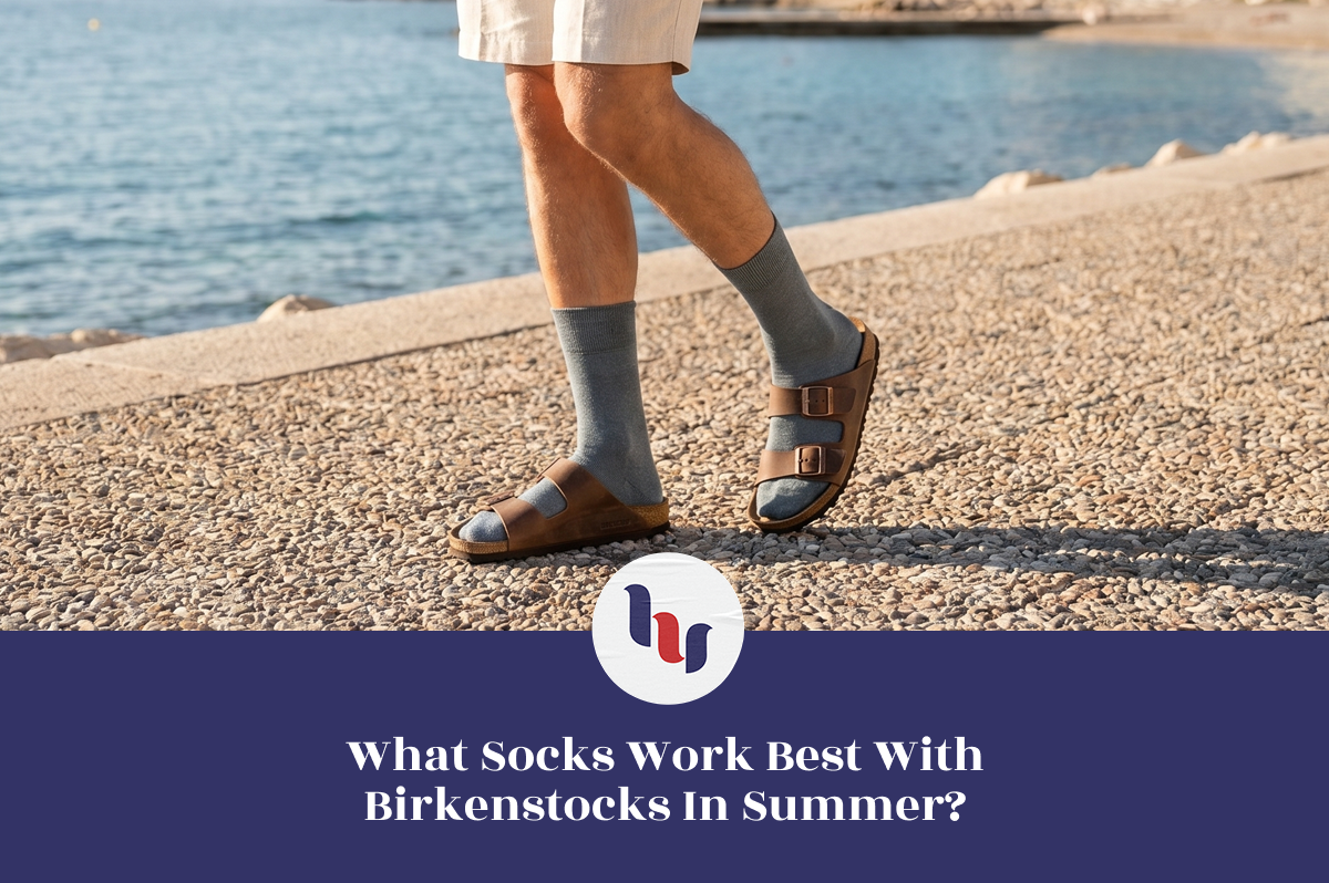 Person walking by the waterfront wearing gray crew socks with Birkenstock sandals during summer.