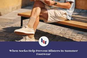 Person sitting on a bench wearing beige shorts, white sneakers, and tan socks with a brand logo overlay.
