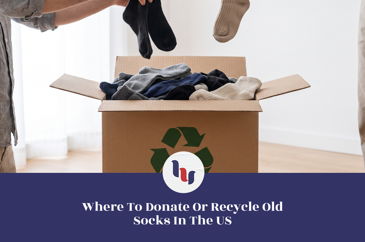 Hands sorting old socks into a cardboard recycling box for donation in the US.