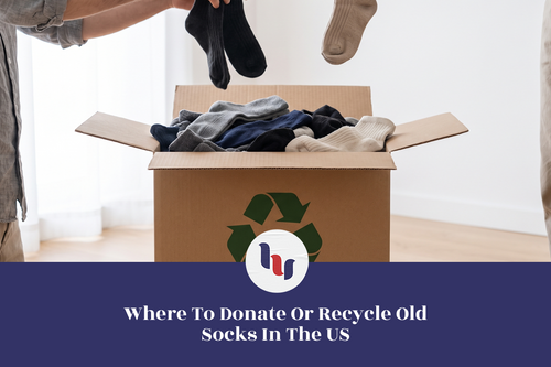Hands sorting old socks into a cardboard recycling box for donation in the US.
