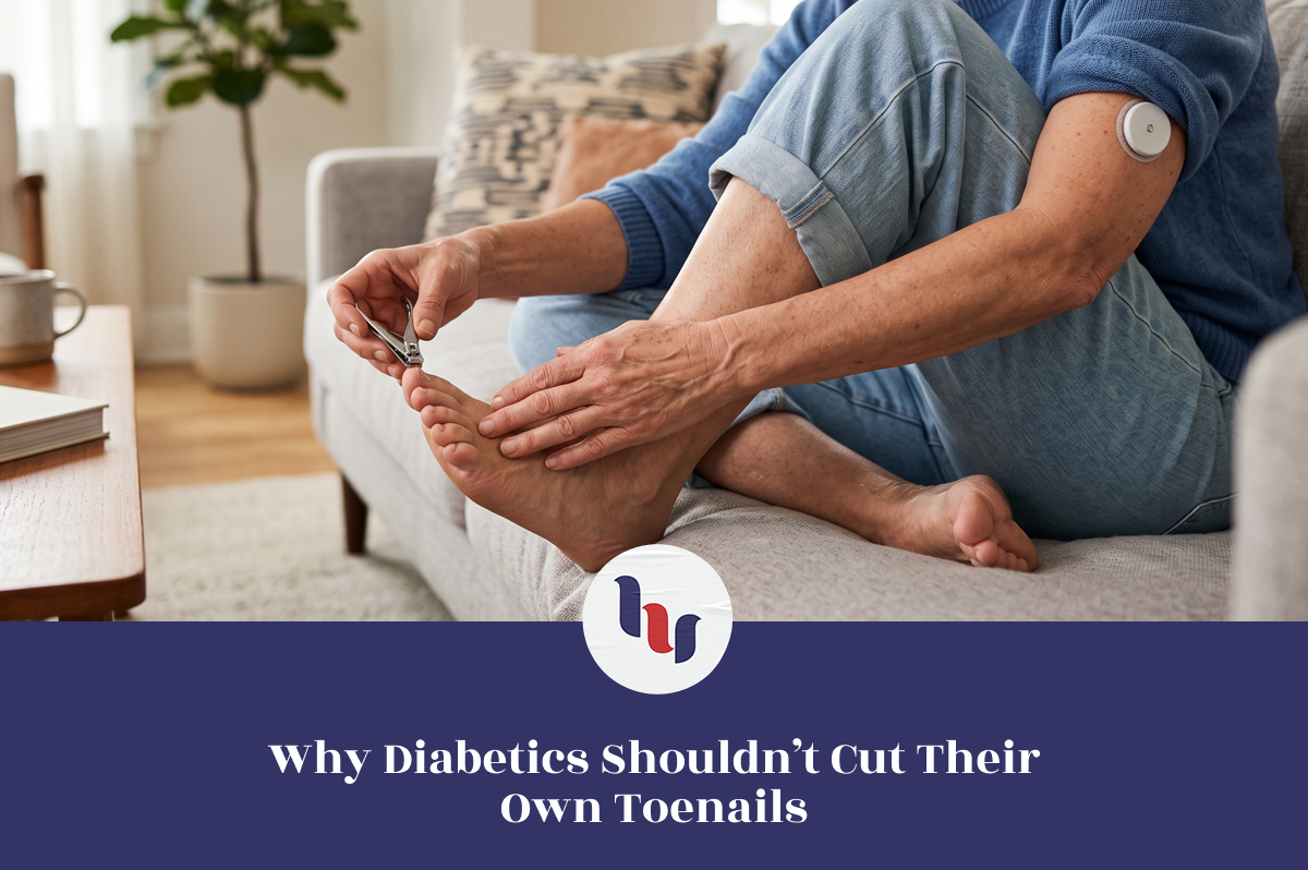 Older woman with a glucose sensor attempting to trim her toenails while seated at home.
