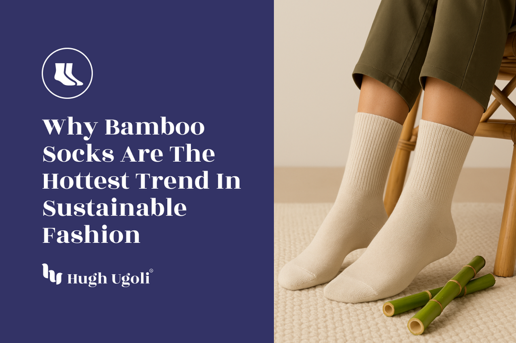 Person wearing cream bamboo socks while seated on a natural chair, with bamboo stalks on the floor — showcasing Hugh Ugoli’s eco-conscious fashion trend