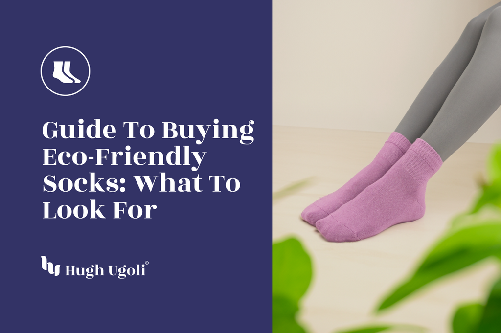 A person's legs crossed at the ankles, wearing Hugh Ugoli's lavender eco-friendly socks, set against a natural, leafy backdrop.