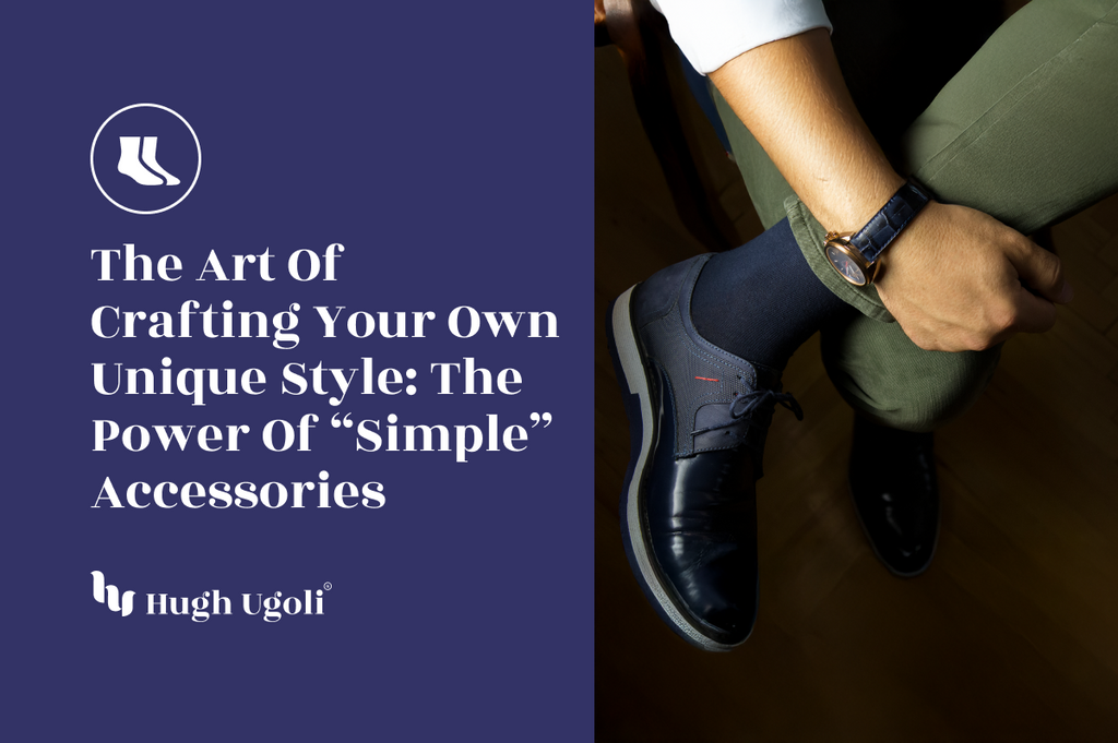 A close-up of a stylish man seated with one leg crossed, showcasing navy socks, polished shoes, and a sleek watch for a sophisticated accessory statement.