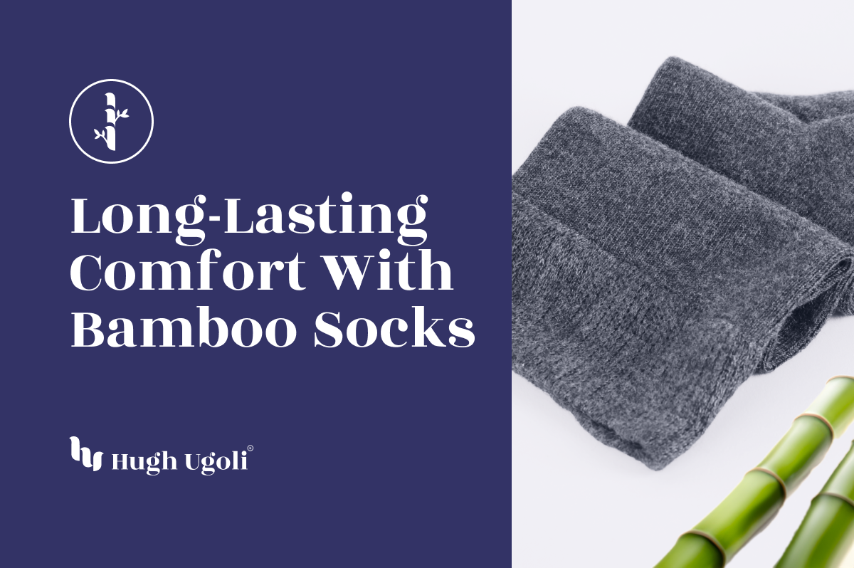 Close-up of folded gray bamboo socks with a bamboo stalk in the foreground, emphasizing the long-lasting comfort of bamboo material.