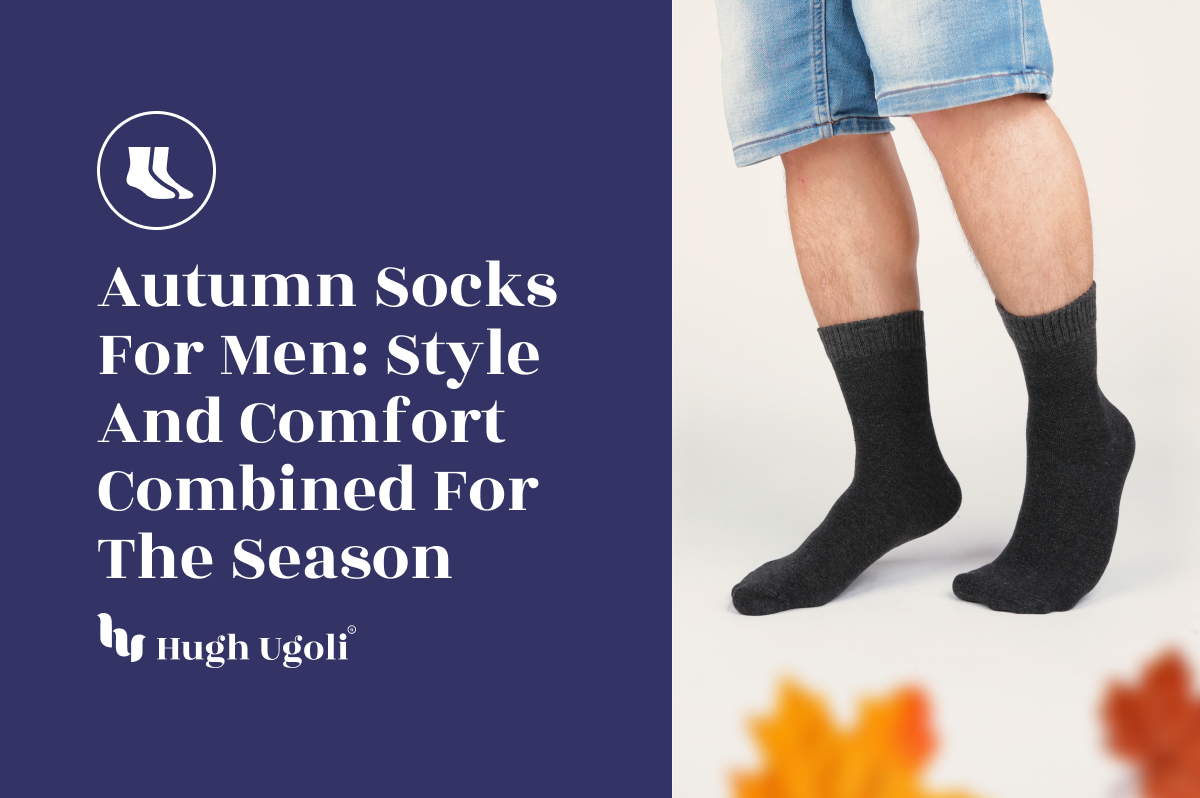 Man wearing dark gray socks and denim shorts, showcasing stylish autumn socks for men with fall leaves in the foreground.