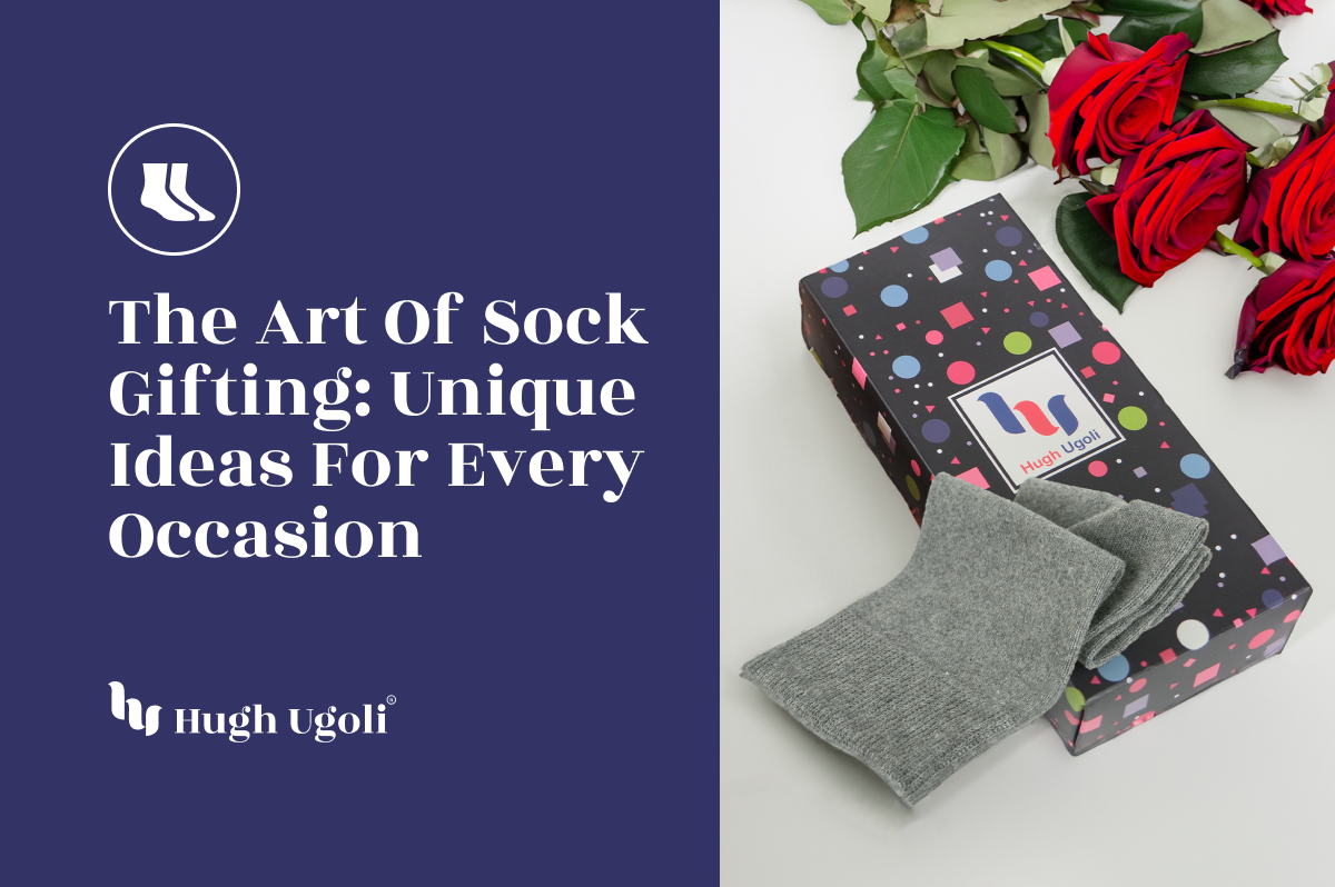 Elegant sock gift set by Hugh Ugoli, with a pair of gray socks partially out of a vibrant patterned box, accented by a bouquet of red roses, suggesting a sophisticated and thoughtful gift for any special occasion.