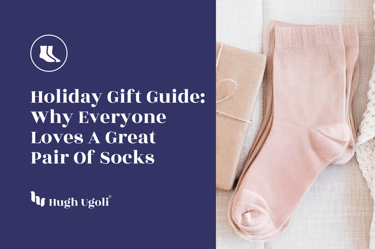 Soft pink socks placed beside a neatly wrapped gift, set against a cozy beige background, perfect for a holiday gift idea.