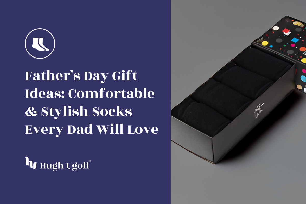 Box of neatly folded black socks with a colorful lid design, presented as a stylish and practical Father’s Day gift idea from Hugh Ugoli.