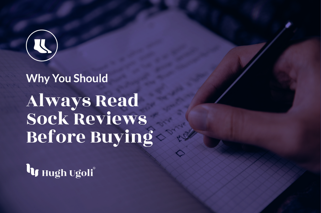The image contains text stating "Why You Should Always Read Sock Reviews Before Buying" by Hugh Ugoli, over a background showing a person writing in a notebook with a pen.