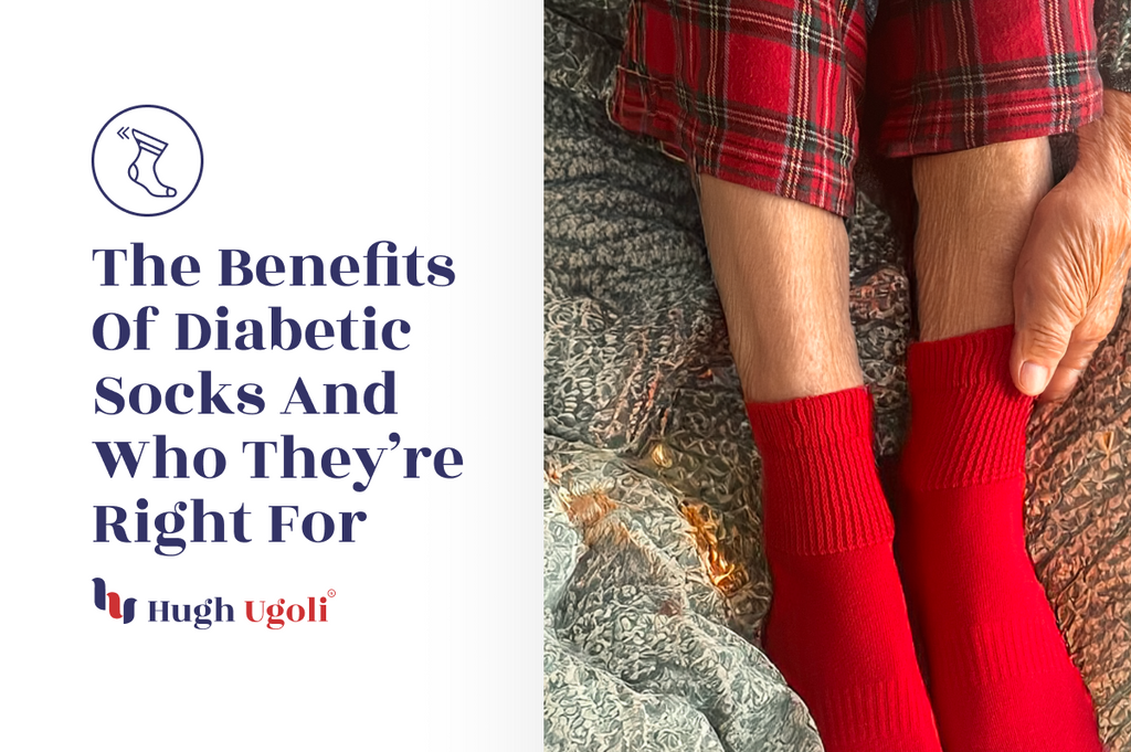 Close-up of a person wearing red diabetic socks, seated on a textured blanket in plaid pajama pants, gently holding their lower leg. This cozy image highlights comfort and warmth, emphasizing the benefits of diabetic socks.