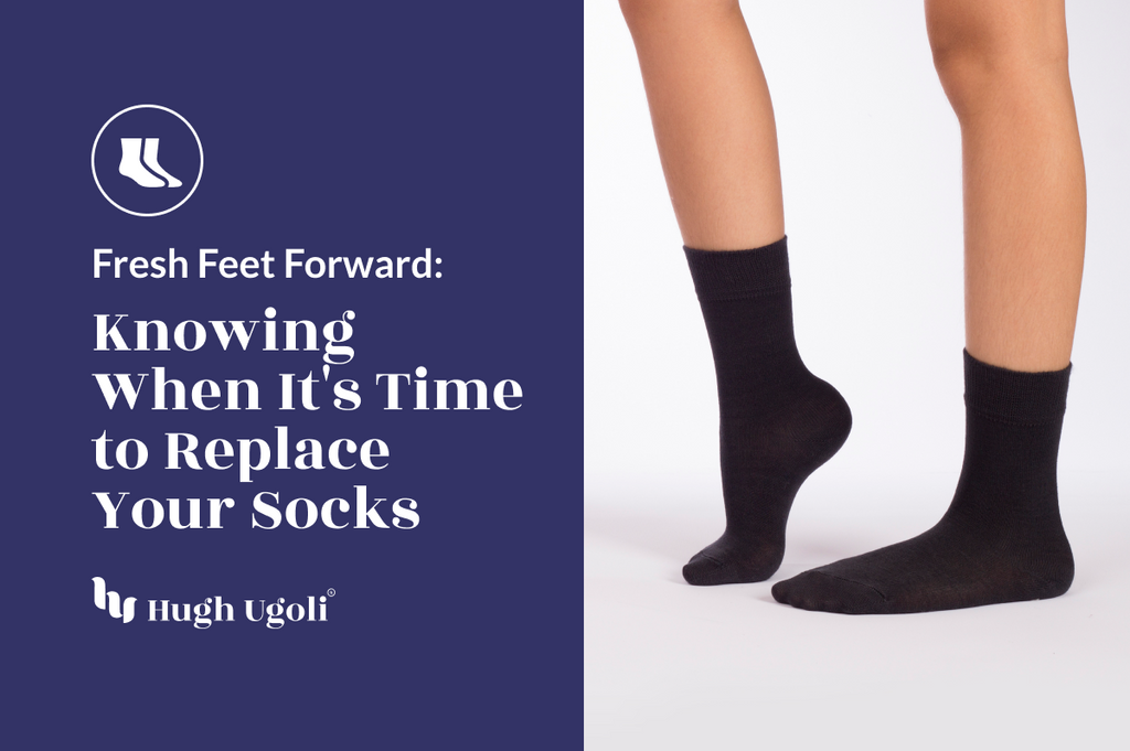 A pair of vibrant purple ankle socks are shown worn on a person's feet, suspended in the air against a white background, highlighting the socks' rich color and snug fit around the ankles.