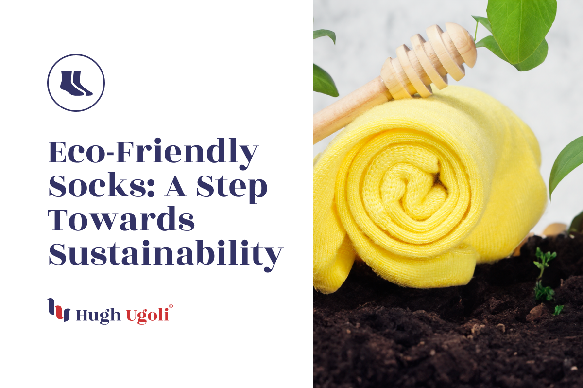 A bright yellow Hugh Ugoli sock rolled up and placed on soil, surrounded by green leaves and a wooden honey dipper, emphasizing eco-friendly and sustainable sock choices.