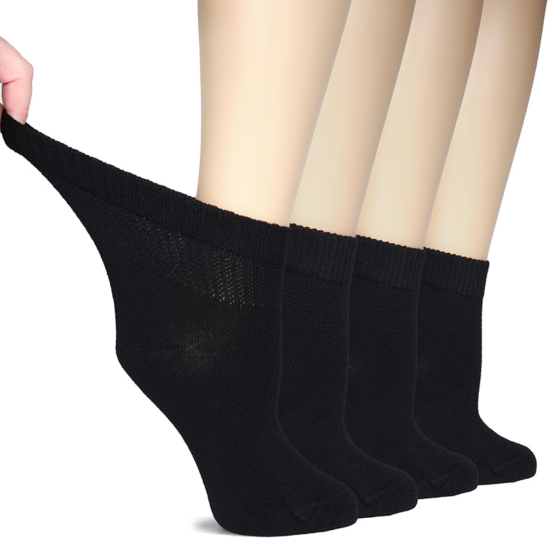 Stay comfy, stylish, and healthy with these black cotton ankle socks for women! Made with soft, breathable bamboo fabric, they provide a perfect fit and support your feet like no other sock out there. Plus, with a seamless toe construction and non-binding top, you won't have to worry about irritation or constriction. Comes with four pairs of socks for added convenience!- Hugh Ugoli