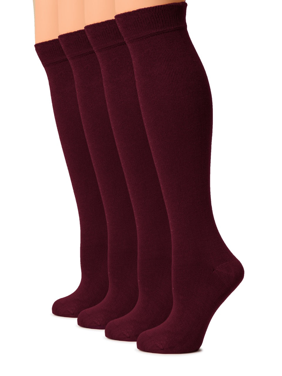 Set of four burgundy knee-high socks on a white background