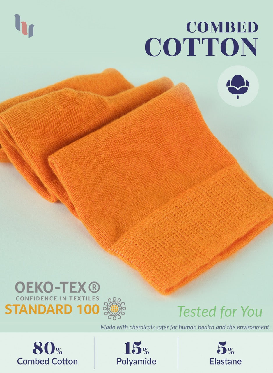 Orange fabric with OEKO-TEX certification on a light green background