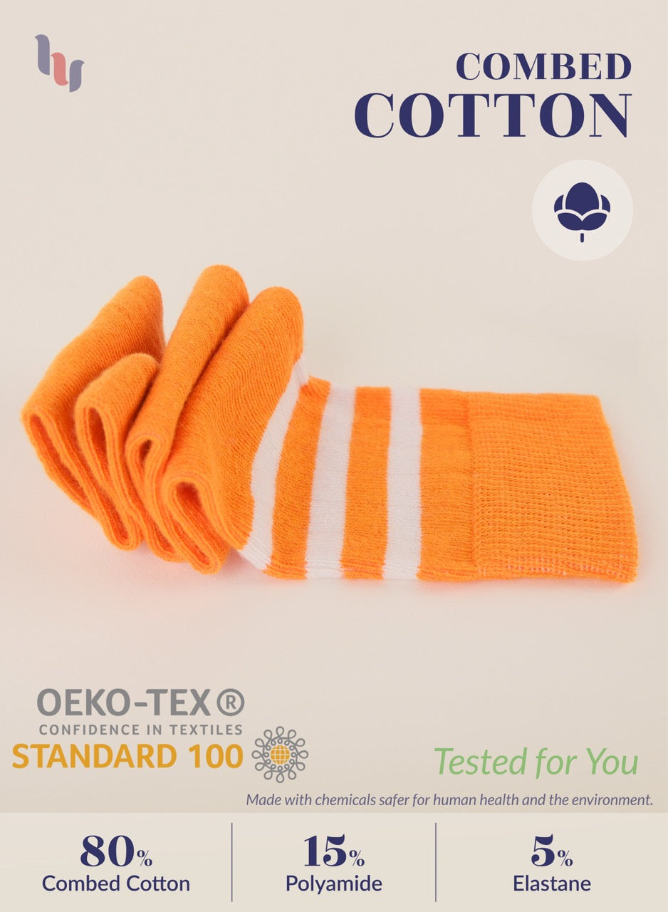 Orange fabric swatch with text about combed cotton and OEKO-TEX certification on a beige background