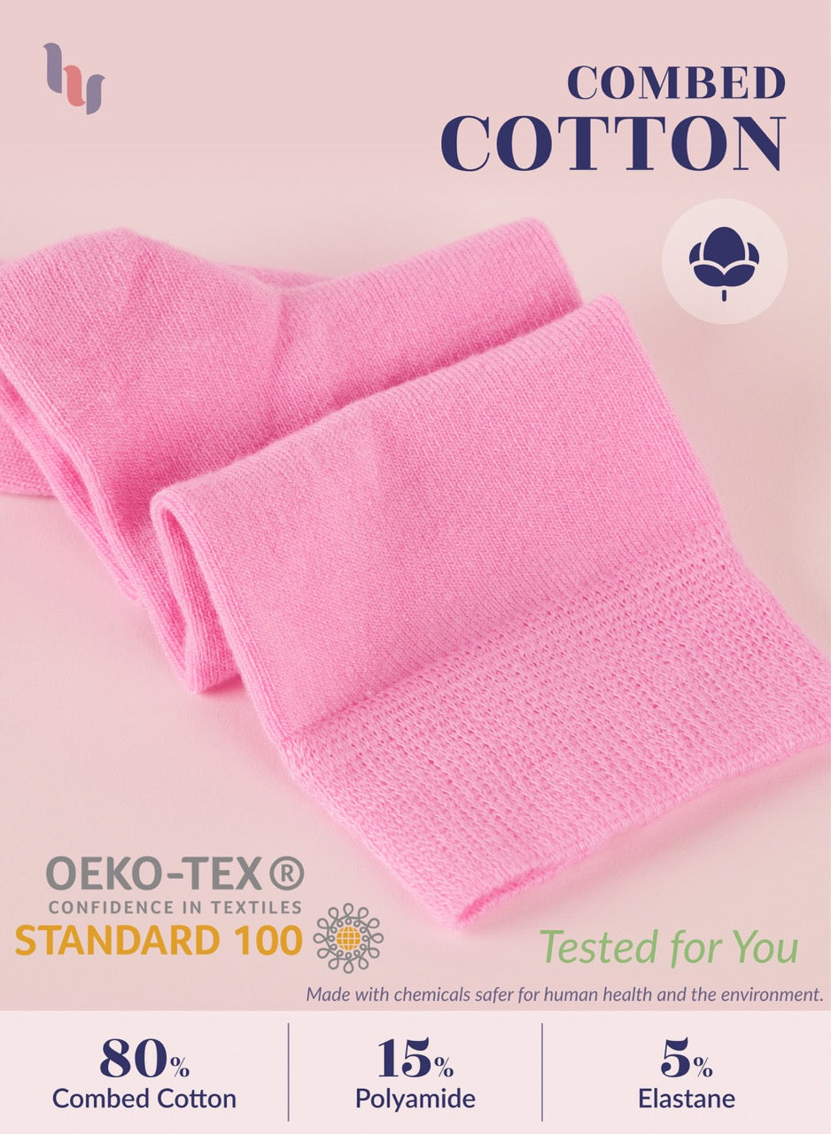 Pink fabric with 'Combed Cotton' and 'OEKO-TEX' branding on a light pink background