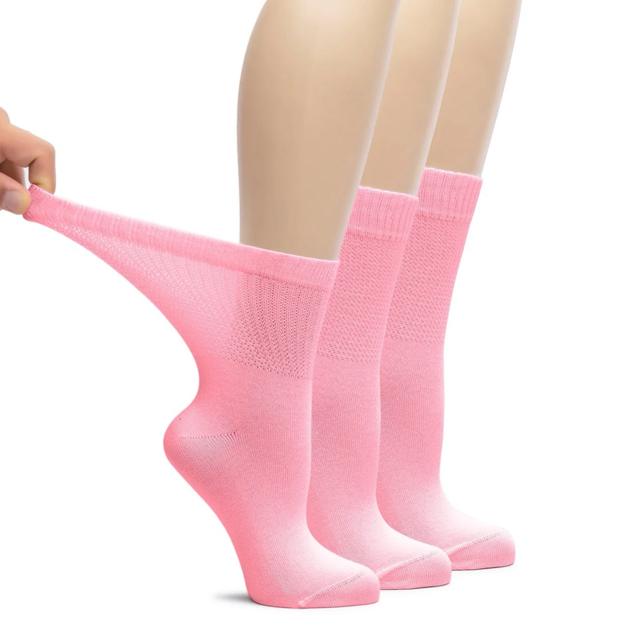 Pink socks being pulled on a white background