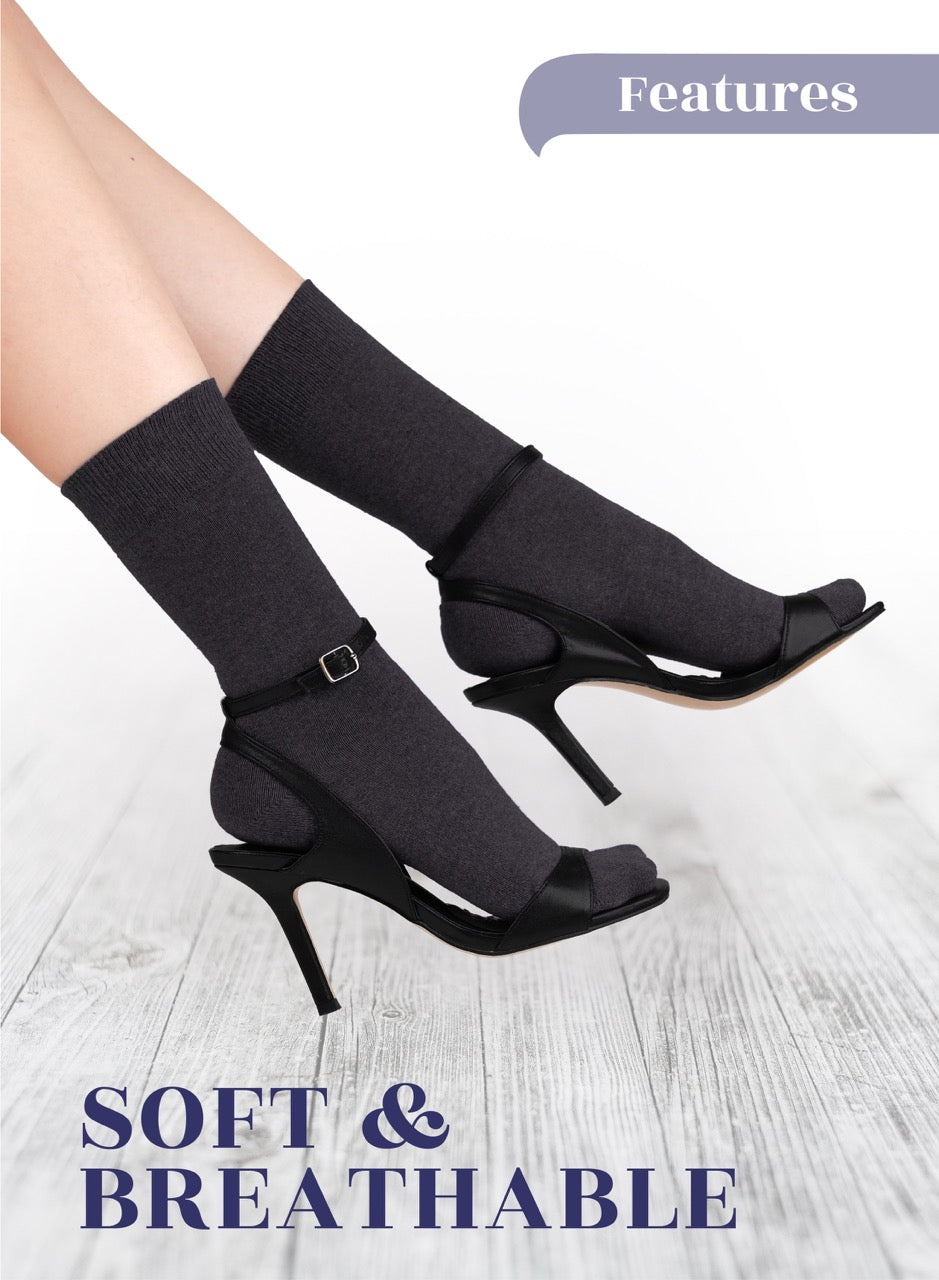 Dark Grey high-heeled shoes with socks on a light wooden floor, featuring text 'Soft & Breathable'.