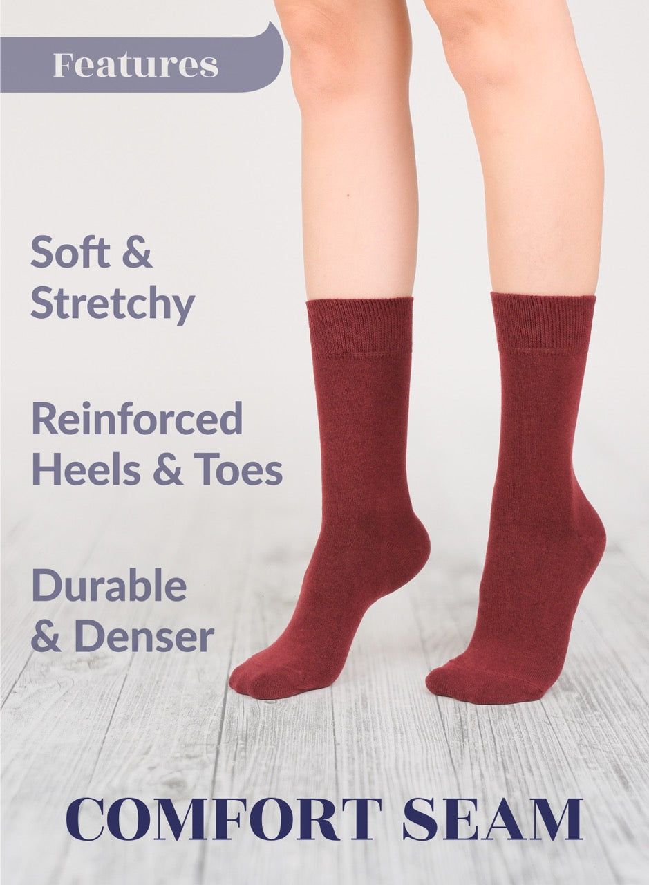 Burgundy socks with text highlighting features on a light background
