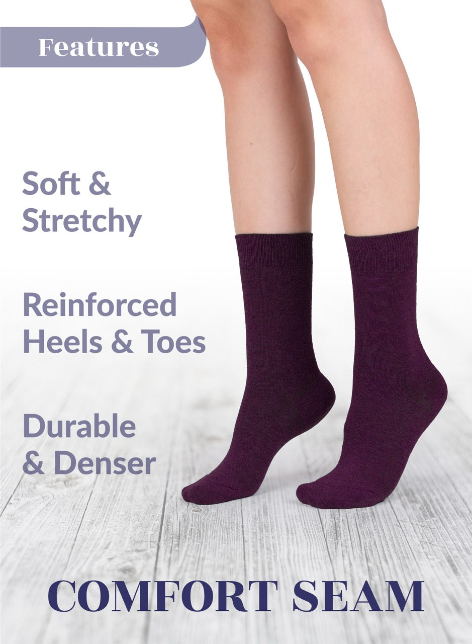 Grape socks with text highlighting features on a light wooden floor background