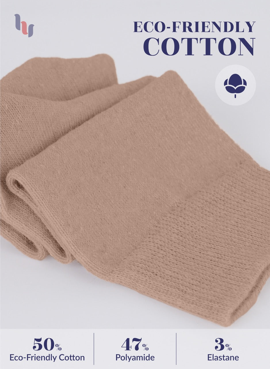 Folded Coffee fabric with eco-friendly cotton label on a light gray background