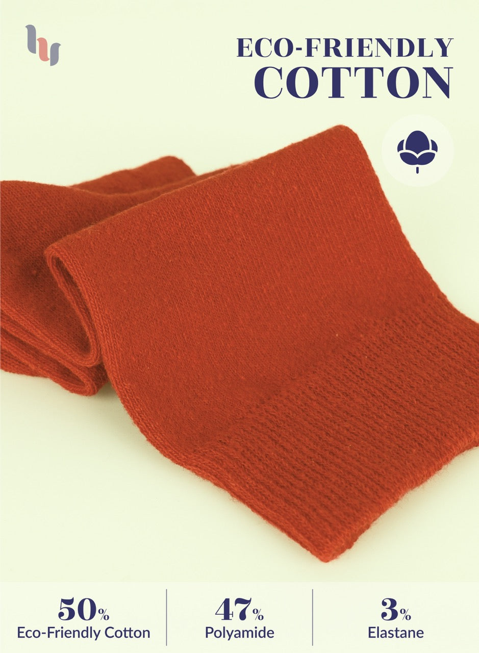 Red fabric with eco-friendly cotton label on a white background