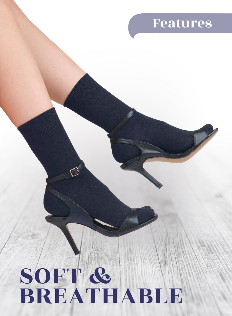 Jeans blue high-heeled shoes with matching socks on a light wooden floor, featuring text 'Soft & Breathable'.