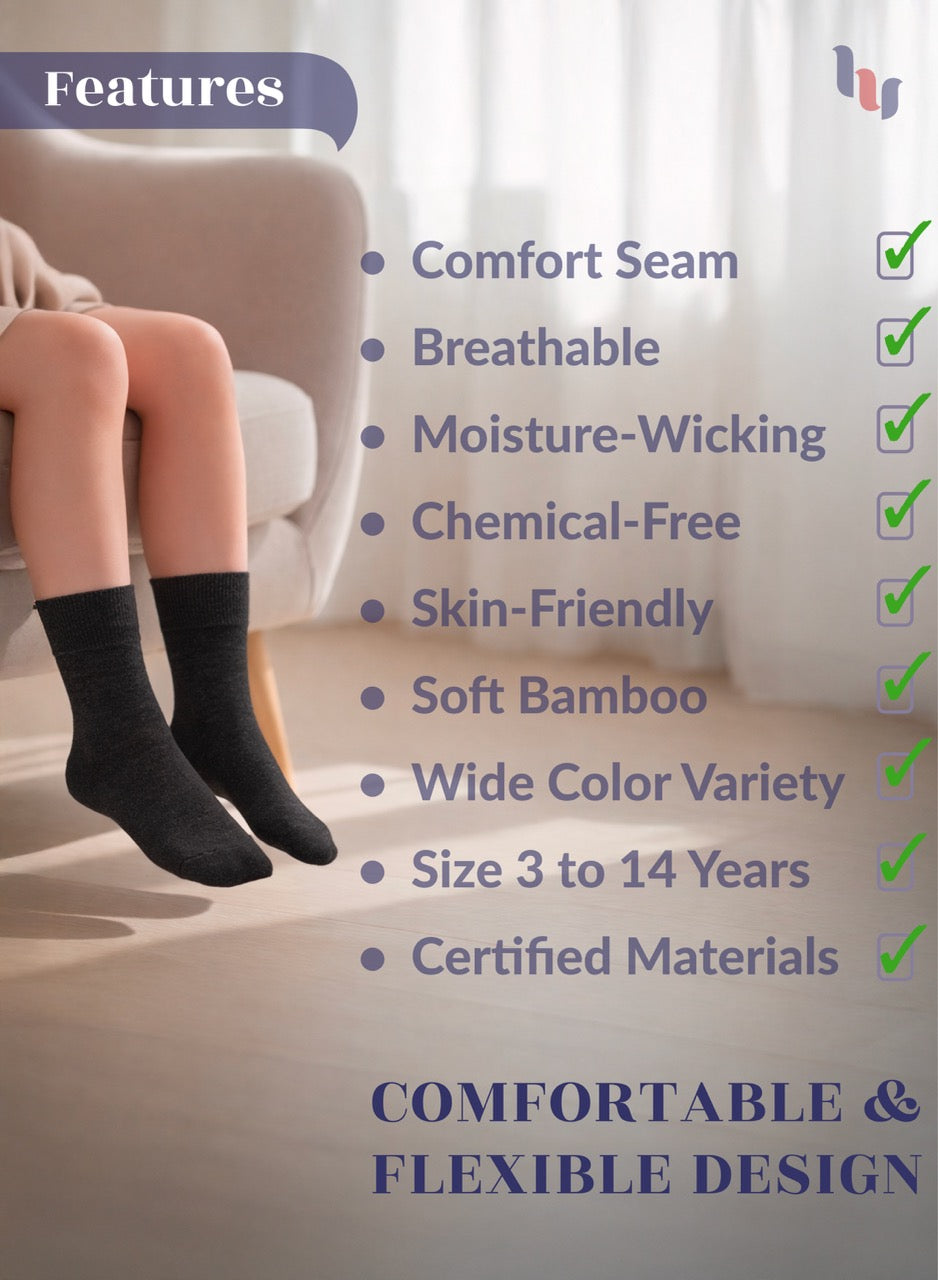 Person wearing charcoal socks with a list of product features on a light background