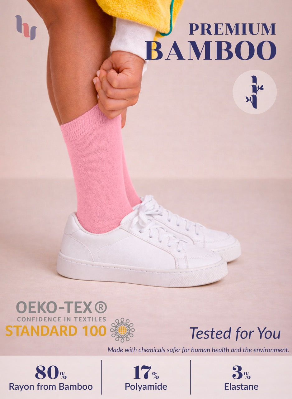 Person wearing pink socks and white sneakers with text about premium bamboo socks on a beige background