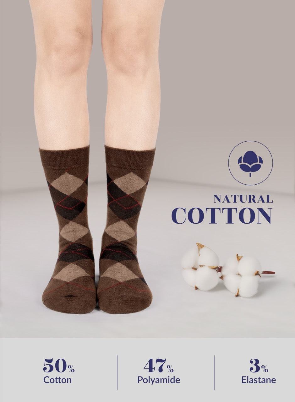 Brown argyle socks worn by a person on a light gray background with 'Natural Cotton' label and cotton fibers.