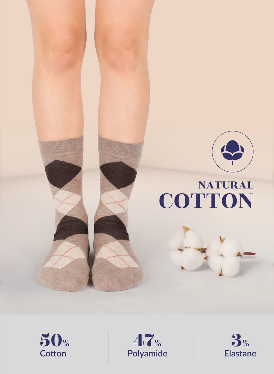 Pair of argyle patterned coffee socks worn by a person on a beige background with 'Natural Cotton' label and cotton plant illustration.