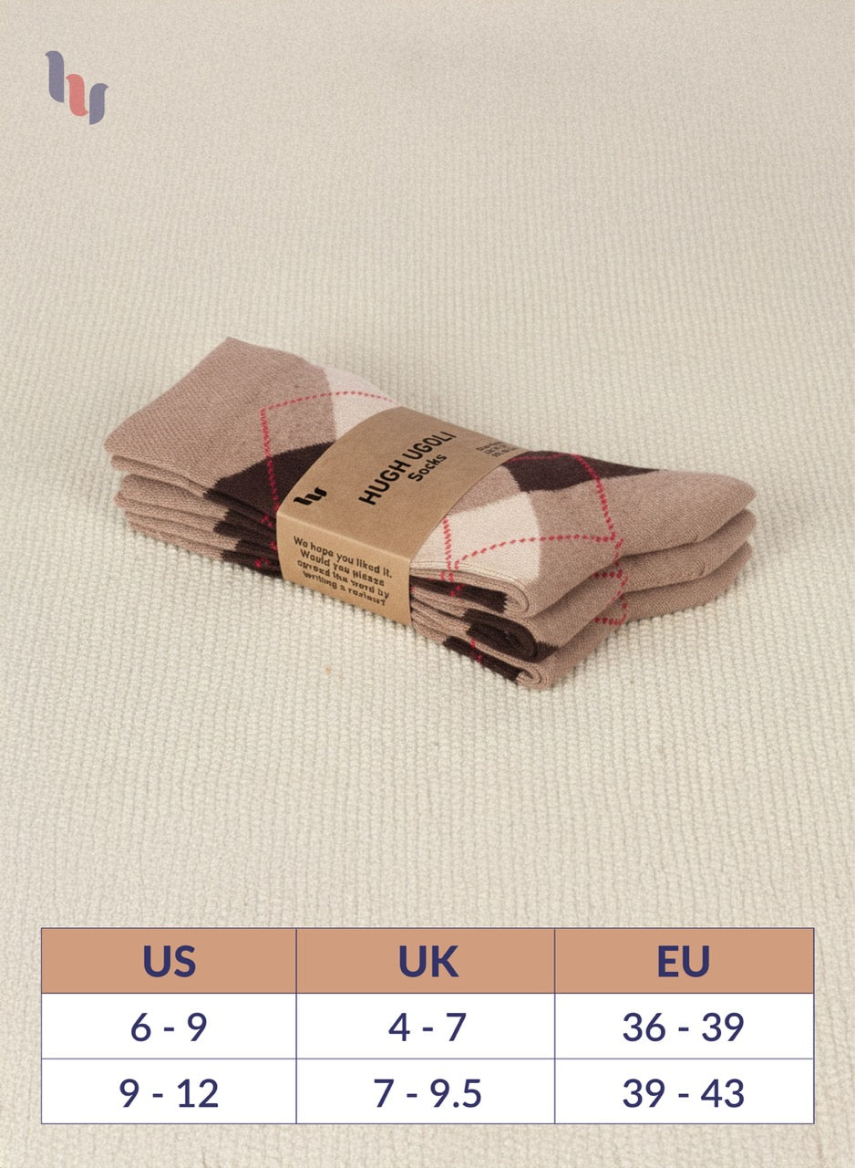 Stack of folded coffee socks with a label on a beige background, featuring a size chart below.