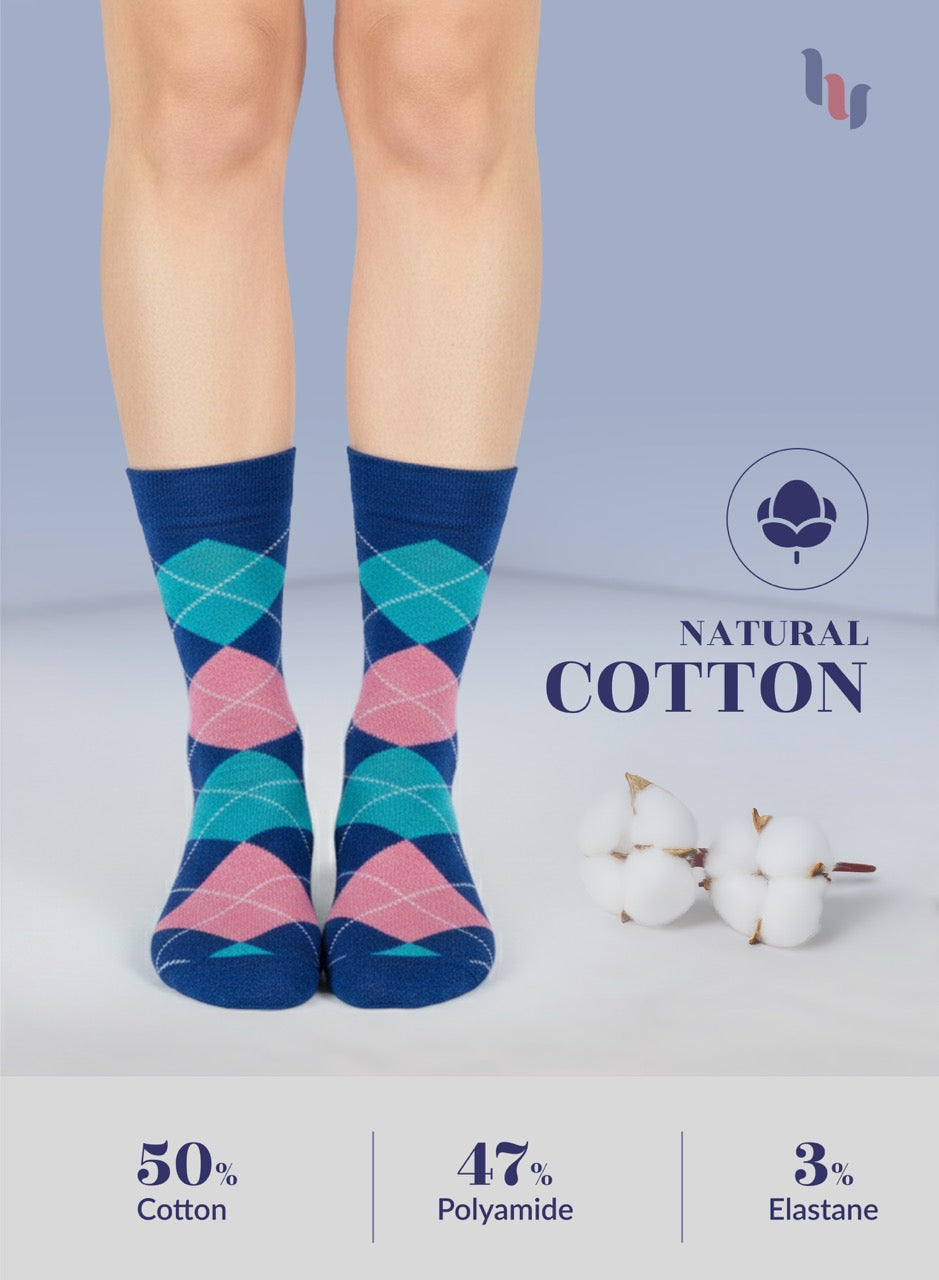 Parliament argyle pattern socks on a person's legs with 'Natural Cotton' label and cotton plant illustration.