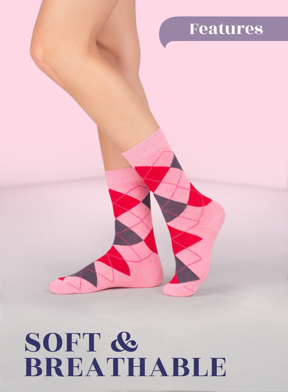 Pink argyle socks worn by a person on a light pink background with text 'Features' and 'Soft & Breathable'.