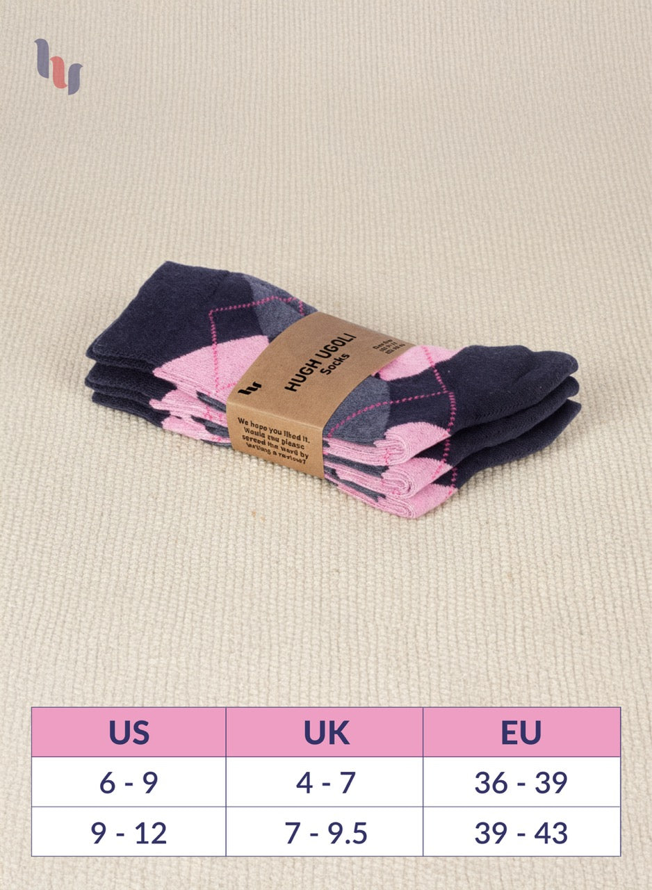 Pack of pink and navy socks with a size chart on a beige background