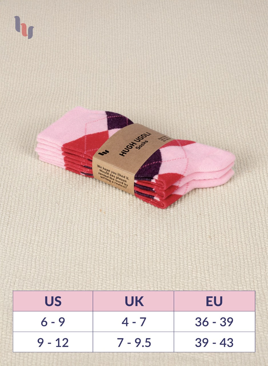 Pack of pink and red checkered socks with a size chart on a beige background
