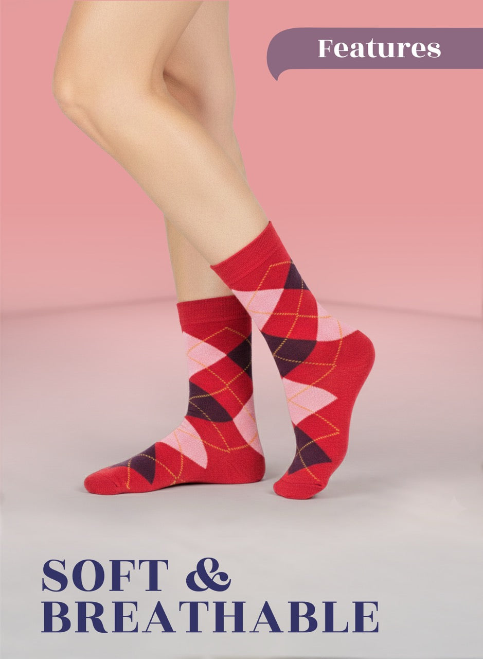 Red argyle patterned socks worn by a person on a pink background with text 'Features' and 'Soft & Breathable'.