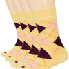 Yellow socks with a geometric pattern worn by a person on a white background